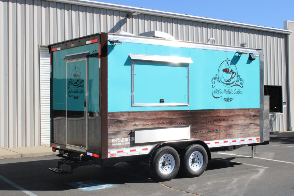 Turquoise custom coffee trailer with a side serving window and diamond-plate exterior panels.
