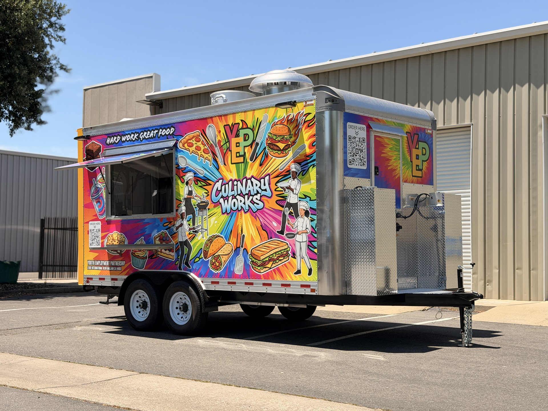 Custom school food trailer for a culinary education program with exterior service window and branded wrap