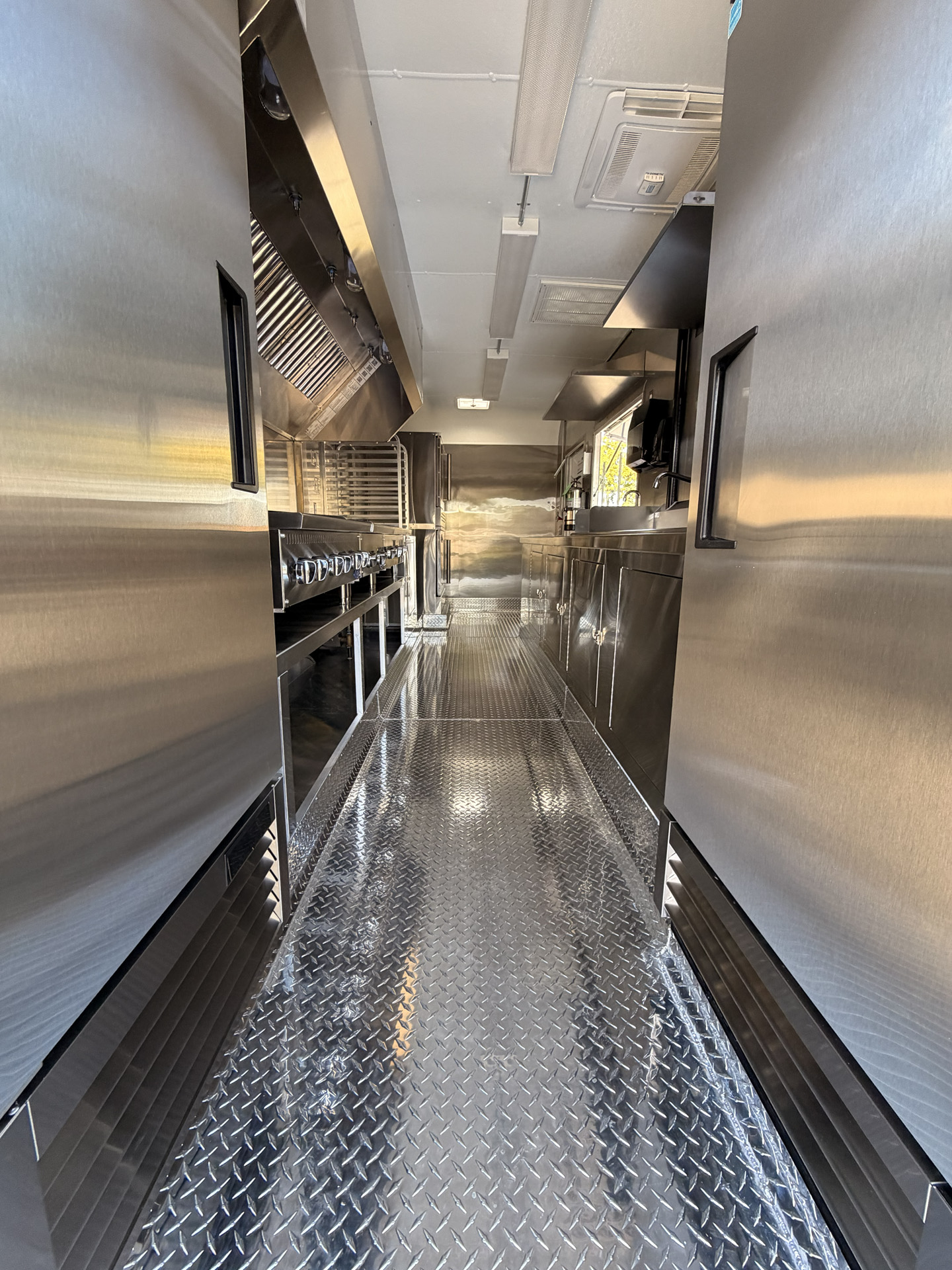 Commercial kitchen interior in a custom food trailer