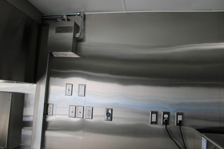 Commercial electrical system with GFCI outlets inside the custom 16ft coffee food trailer.
