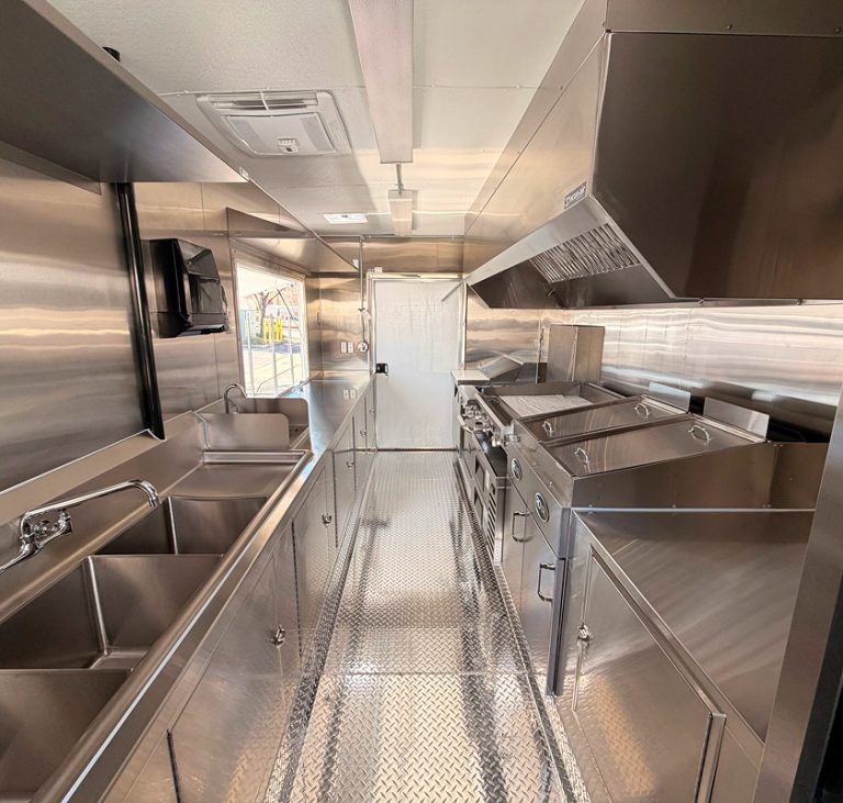 Stainless steel interior of a custom commercial food trailer built by Golden State Trailers