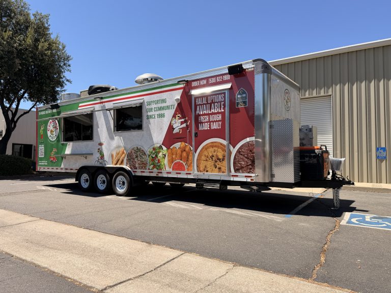 custom pizza food trailer rear three-quarter view with wrap, service area, and rooftop equipment