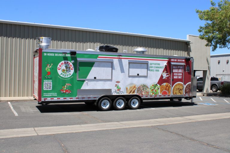 30-ft commercial pizza trailer side profile with custom wrap, service windows, and rooftop kitchen systems