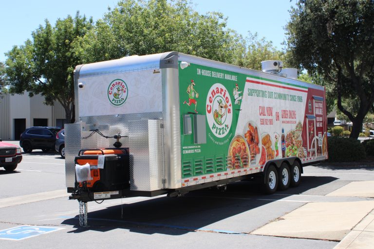custom mobile pizza kitchen front-side exterior with branded wrap, service area, and commercial trailer body