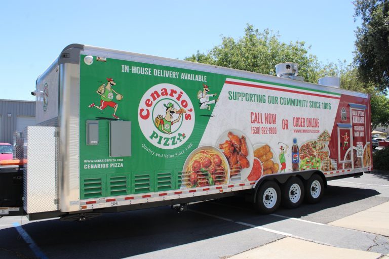 custom pizza trailer exterior with branded wrap, commercial service windows, rooftop ventilation, and triple axles
