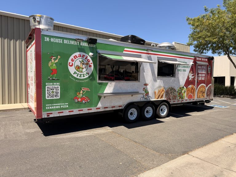 commercial pizza food trailer with dual service windows, exterior shelf, custom wrap, and rooftop ventilation