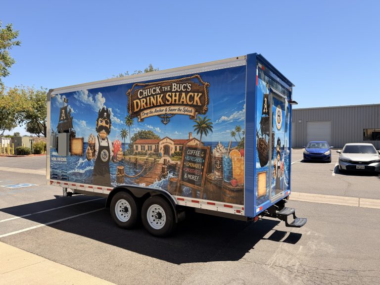 Rear three-quarter view of the Avenal High School food trailer with custom exterior graphics