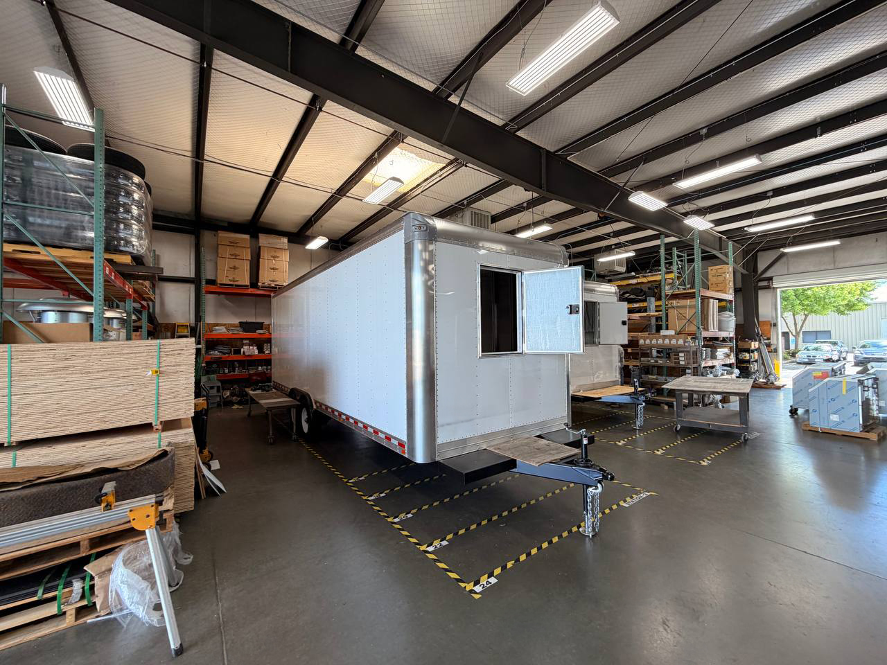 Custom food trailer under construction inside the Golden State Trailers manufacturing facility